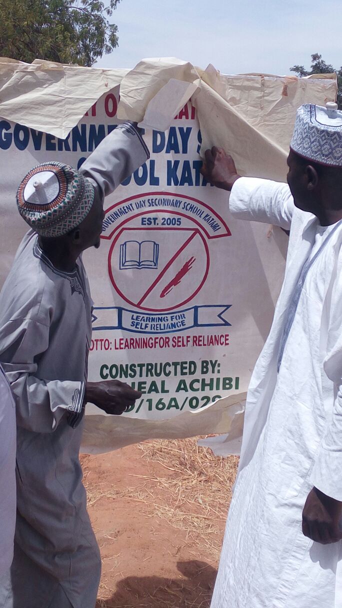 Micheal Achibi constructs signpost for GDS School Katami